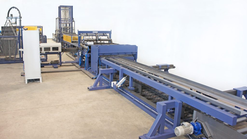 Welding line for concrete block reinforcement and precast elements