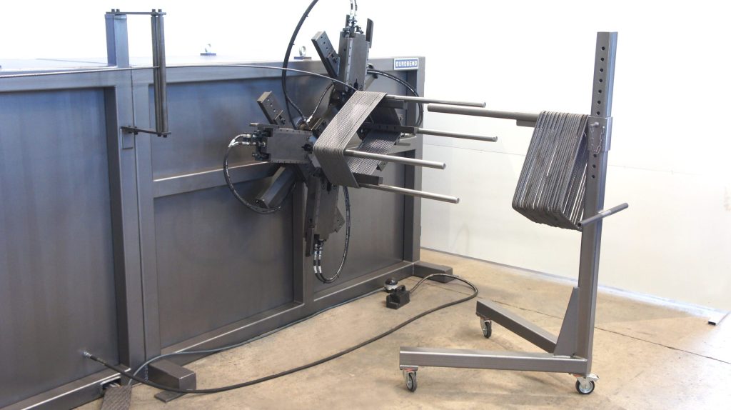 Continuous rectangular spiral forming machines