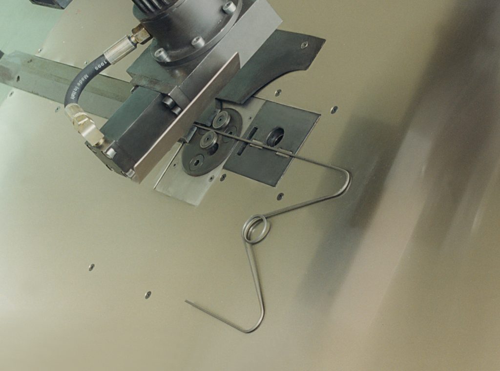 Wire frame and side support spring production